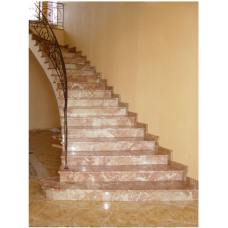 Мраморная радиальная лестница изготовлена из мрамора Тиа роз